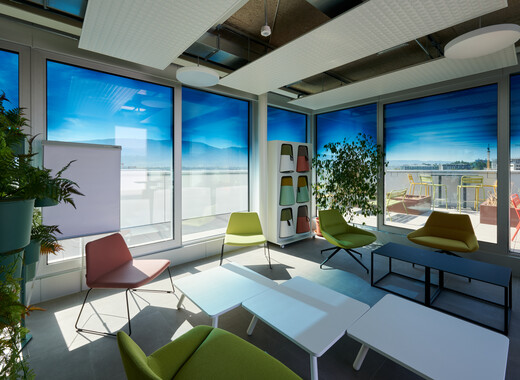 Office space inside the Tower with SageGlass Smart Windows tinted on a gradient.
