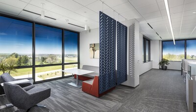 Office lounge with smart glass windows.